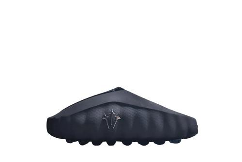 Black closed-toe massage slide sandal with full-coverage upper and textured nodule footbed, product view